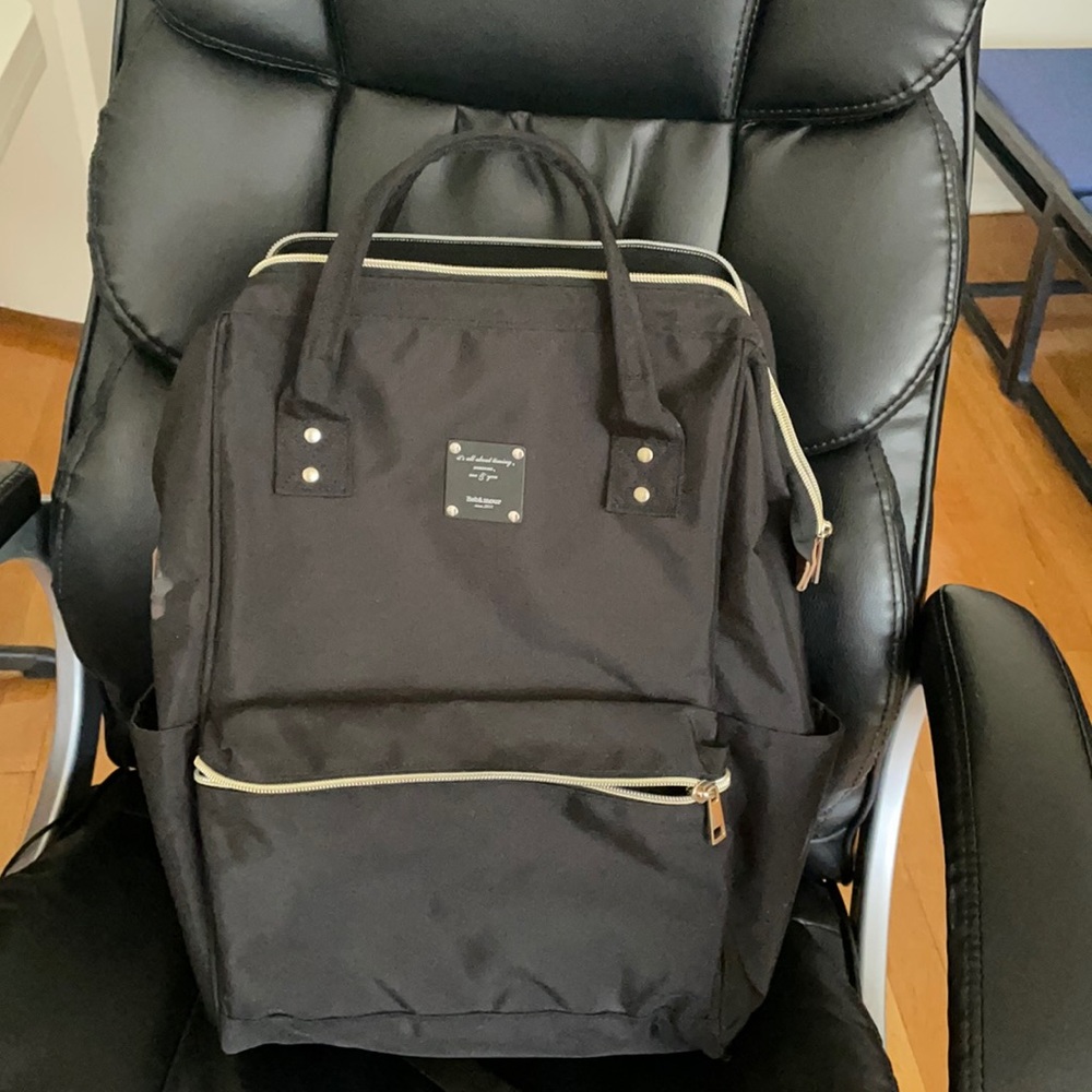 Only used a handful of times! Black backpack/diaper bag